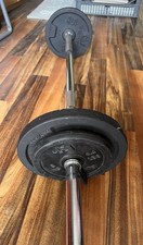 Bilanciere da 10kg e rispettivi dischi pesi da 5kg e 2kg