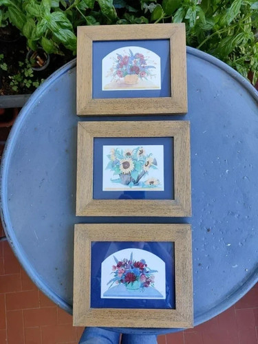 Tre quadri moderni con stampe