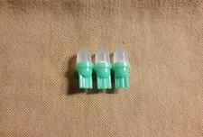 (3)GREEN FROSTED 8V LED WEDGE