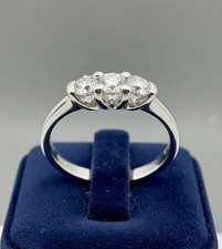 ANELLO TRILOGY ORO BIANCO 18 KT CON DIAMANTI NATURALI 0,60 CT