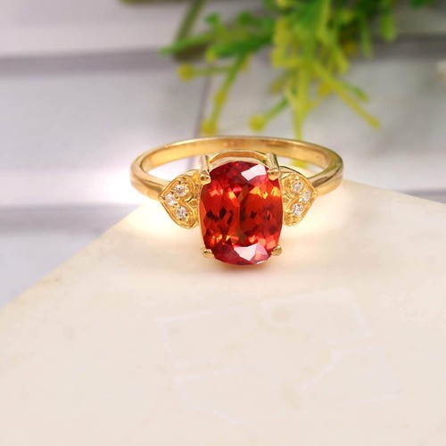 Anello con zaffiro arancione - con,
