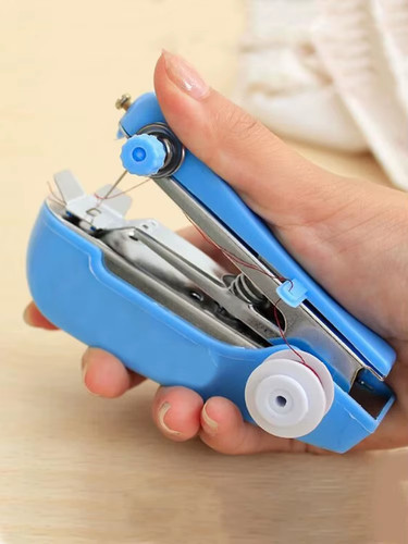 Macchina cucire portatile - da,