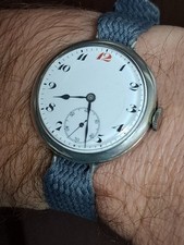 Zenith military trench watch, silver case, enamel dial, serviced, red 12