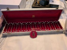 Set di dodici poggiaposate con