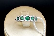 ANELLO VERETTA IN ORO BIANCO 18 KT. TIT. 750 CON SMERALDI E BRILLANTI.