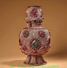 Vaso bottiglia fiori palazzo
