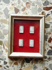 4 LINGOTTINI IN ARGENTO BRONZI