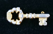 Spilla da bavero chiave oro