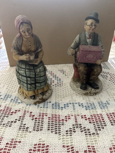 Coppia statuine - , in