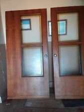 Porta doppia  due Ante uguali cscorrevole artiginale .vetro piombato legno pieno