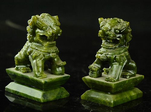 Statue intagliate mano verde - a,