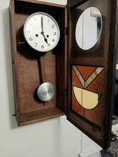 Antico orologio da parete