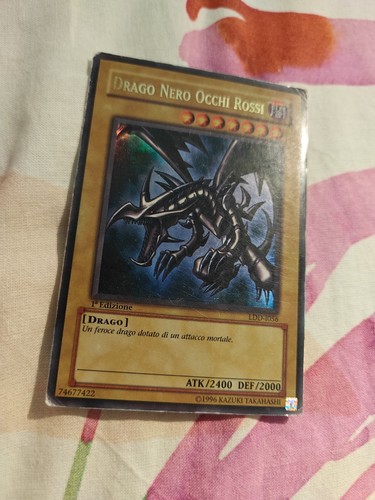 Drago nero occhi rossi - drago,