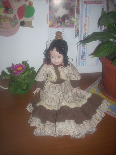 Bambola porcellana o - in,