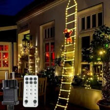 Babbo Natale su scala luminosa