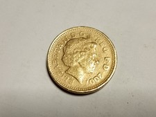 Moneta una sterlina inglese - moneta,