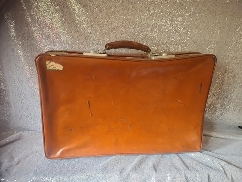 Valigia vintage marrone manico