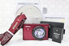 Nikon 1 J3 in (rosso scuro) -