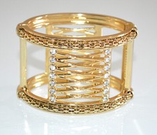 Bracciale donna rigido oro dorato metallo a schiava strass brillantini UA74