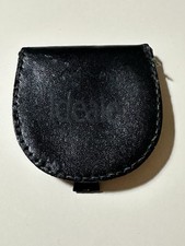 Porta spiccioli artigianale a forma di tacco unisex in pelle nero testa di moro.