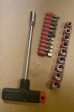 Set chiave a “T” cacciavite/bussola + 11 ins. a taglio/croce/torx + 9 ins. buss.