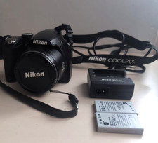 Nikon Coolpix P90 fotocamera digitale con 2 batterie e caricabatterie