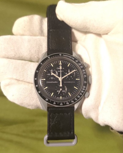 Swatch omega mission - swatch,