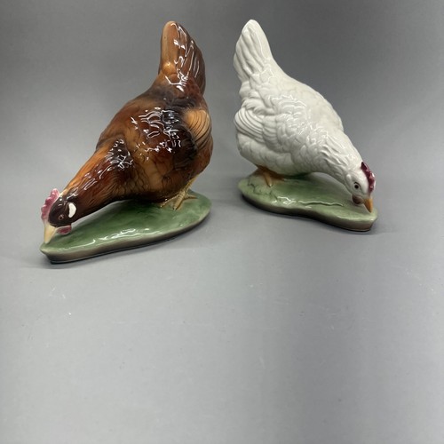 Coppia sculture figure gallo