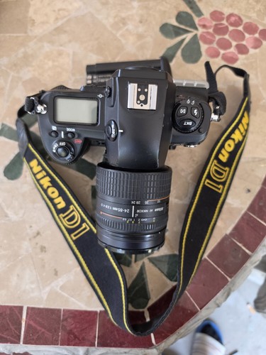 Nikon con obiettivo - obiettivo,