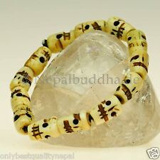 Bracciale Teschio Bianco Osso Intagliato Elastico Teschi Rocker Regalo