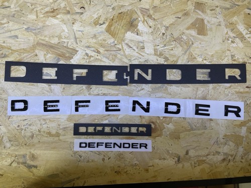 Defender scritte nero lucido - defender,