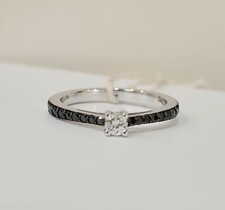 Anello solitario diamante 0,15