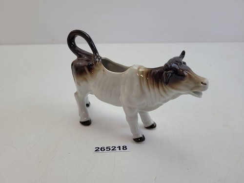 Lattiera forma mucca