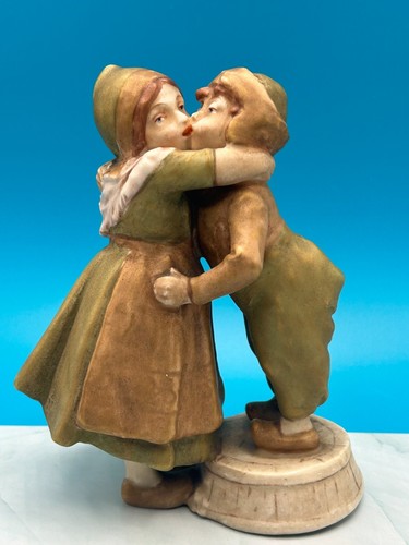 Antica statuina porcellana