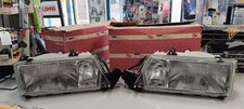 Coppia fari proiettori dx-sx Lancia Dedra con lavafari Carello 32941111+32951111