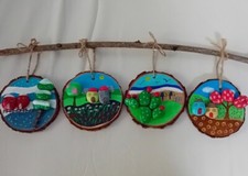 Quadretti 4 stagioni realizzati a mano con legno e sassi dipinti