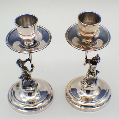 Coppia candelabri figure