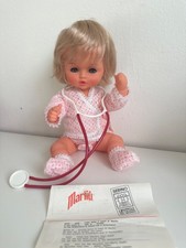 Bambola Marilù Sebino, fondo