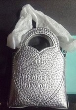 Please Return To Tiffany & Co