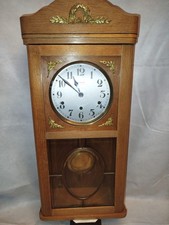Antico orologio da parete