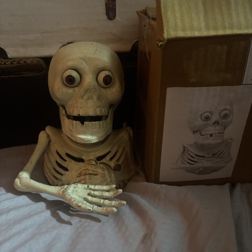 Skeleton money box cast iron - box,