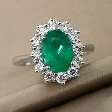 Anello fiore con Smeraldo
