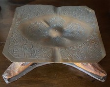 posacenere antico con teste di