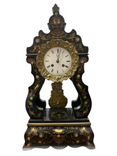 Antico orologio a pendolo a