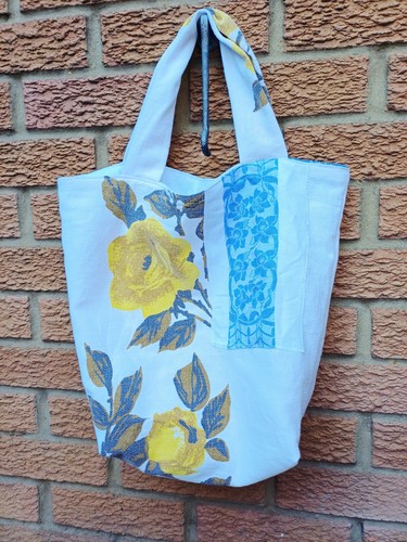 Borsa mercato rose gialle
