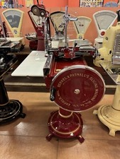 affettatrice berkel mod 23 restaurata rossa con piedistallo