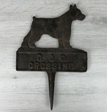 Dog crossing metal lawn - dog,