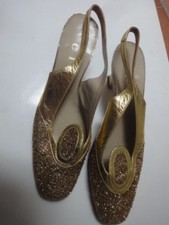 Scarpe n° 36 in pelle oro e