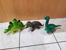 lotto 4 dinosauri in plastica-gomma- senza marchio