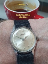 Orologio svizzero vintage revisionato NIVADA COMPENSAMATIC 17 Jewels